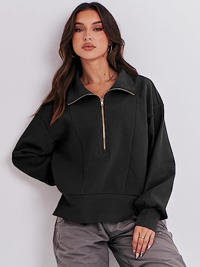 Maglione donna Valstrend con mezza zip, maniche lunghe e collo alto, in tessuto morbido e confortevole.