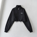 Cardigan sportivo Valstrend con colletto alto, zip frontale, polsini elasticizzati e stile windproof, corto e alla moda.