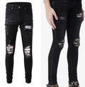 Jeans da uomo Valstrend Shop con pieghe stampate e toppe, stile casual e moderno, dettaglio delle pieghe e delle patch.