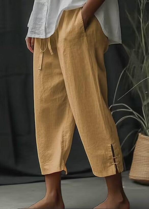 Pantaloni larghi in cotone e lino Valstrend, stile casual, con taglio ampio e tessuto leggero, visibili in primo piano.