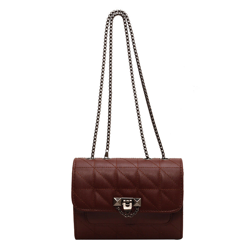 Borsa a spalla femminile Valstrend con catena e chiusura, stile fashion messenger bag in pelle con dettagli eleganti