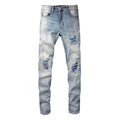Jeans skinny stretti Valstrend con patch rotti e dettagli distress, colore bianco brillante lavato, stile casual e moderno.