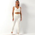 Reggiseno sportivo senza cuciture Valstrend, rapido asciugatura, shockproof, per yoga e allenamenti, con pantaloni sportivi coordinati.