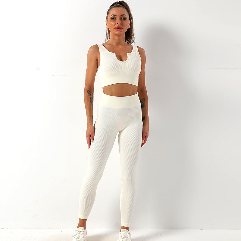 Reggiseno sportivo senza cuciture Valstrend, rapido asciugatura, shockproof, per yoga e allenamenti, con pantaloni sportivi coordinati.