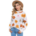 Maglione femminile Valstrend in filato lavorato a maglia con motivo floreale, morbido e elegante, indossato da donna.