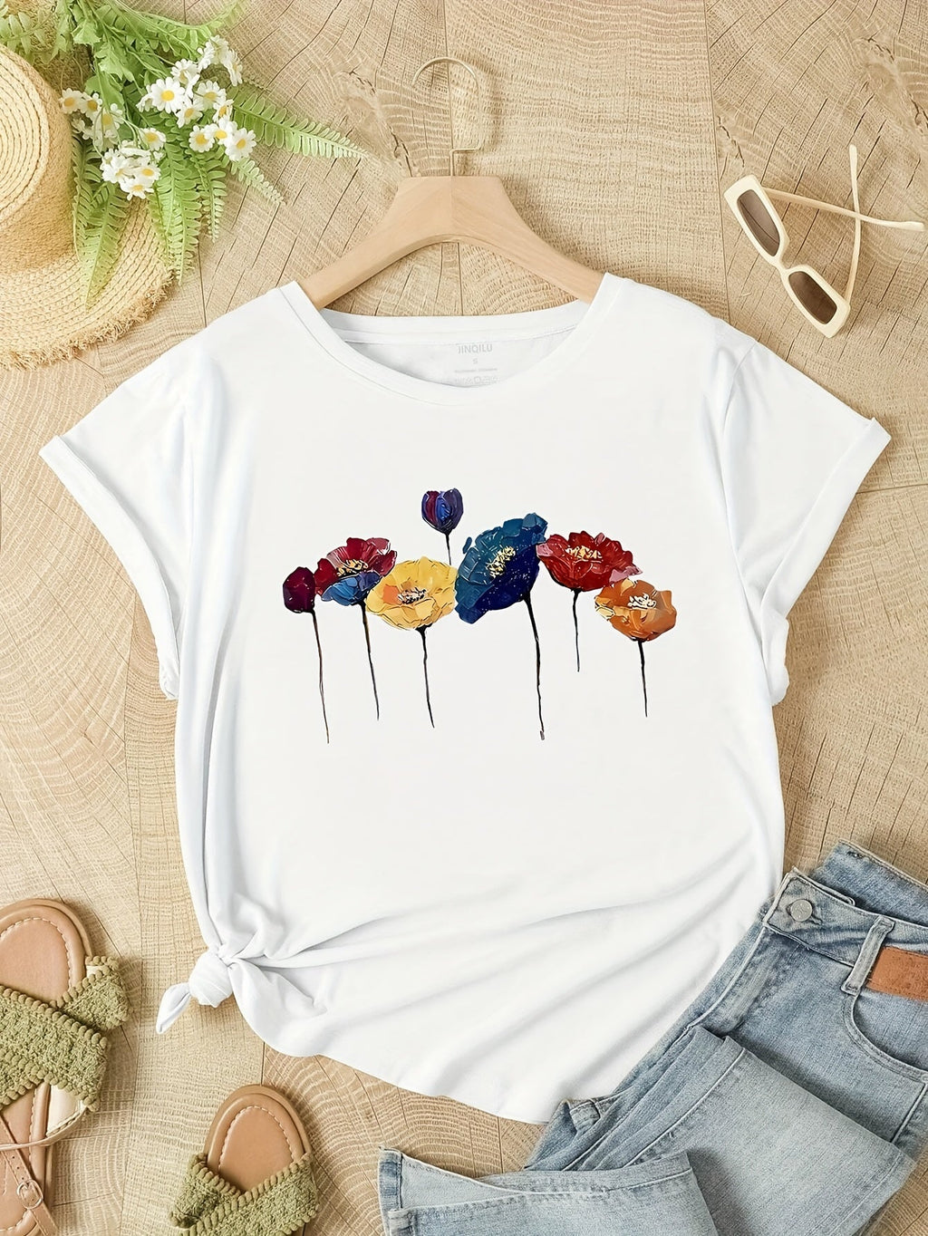 T-shirt donna Valstrend con stampa floreale a girocollo, maniche corte, ideale per primavera ed estate.