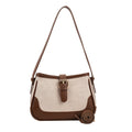 Borsa tracolla Valstrend con texture avanzata, forma quadrata e design a spalla, elegante e funzionale.