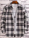 Camicia casual da uomo a maniche lunghe Valstrend, grande e comoda, mostrata in immagine con collo e bottoni visibili.