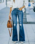 Pantaloni a campana lavati elasticizzati con strappi per donna, stile trendy e casual, in denim di marca Valstrend shop.