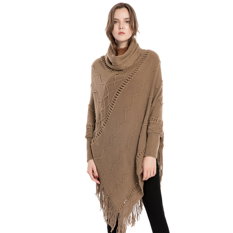 Maglione in acrilico con frange, collo alto e maniche calde, stile poncho, marca Valstrend shop, ideale per l'inverno.