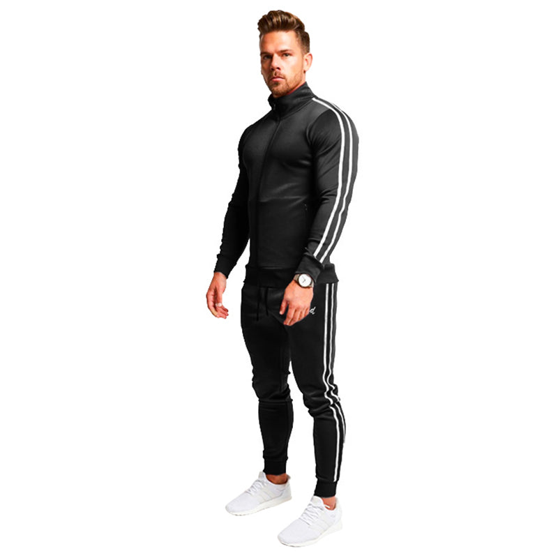 Completo sportivo da uomo Valstrend, giacca e pantaloni in tessuto tecnico, ideale per allenamenti e attività sportive.