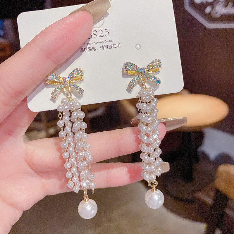 Orecchini in Argento Sterling con perle di lusso, design elegante e raffinato, ideale per uno stile sofisticato e femminile