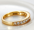 Anello da matrimonio in oro 18K con zirconi AAA, stile europeo e americano, design elegante e rifinito di alta qualità.