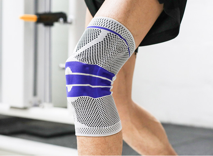 Ginocchiere da corsa sportiva Valstrend con cinghie di protezione e supporto per allenamenti e attività fitness.