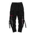 Pantaloni hip hop neri di Valstrend shop con dettagli in tessuto, stile urbano e vestibilità comoda, visibili nell'immagine.