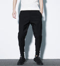 Pantaloni harem larghi a righe scure di Valstrend, stile casual e comodo, con vestibilità ampia e tessuto leggero.