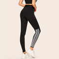Leggings da yoga femminili bianche, stile fashion, Valstrend shop, con tessuto elastico e design aderente.