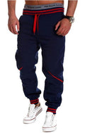 Pantaloni jogger hip hop harem Valstrend in tessuto comodo con elastico in vita e polsini, stile casual e urbano.