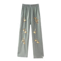 Pantaloni eleganti Valstrend in stile western con paillettes, linea dritta, adatti a tutti i look, dettagli lucidi e alla moda.