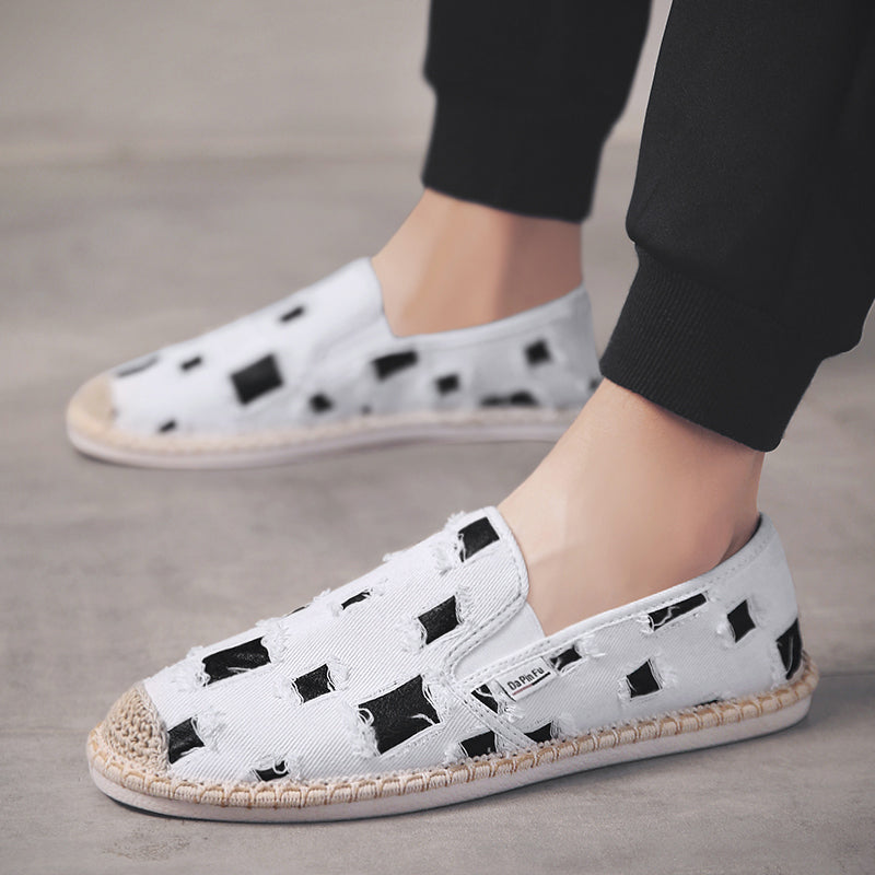 Scarpe da uomo in tela Valstrend Shop, con design classico, suola bianca e dettagli in tessuto blu, visibili nell'immagine.