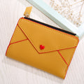 Portafoglio donna Valstrend a forma di cuore in pelle PU, compatto e elegante con scomparti interni.