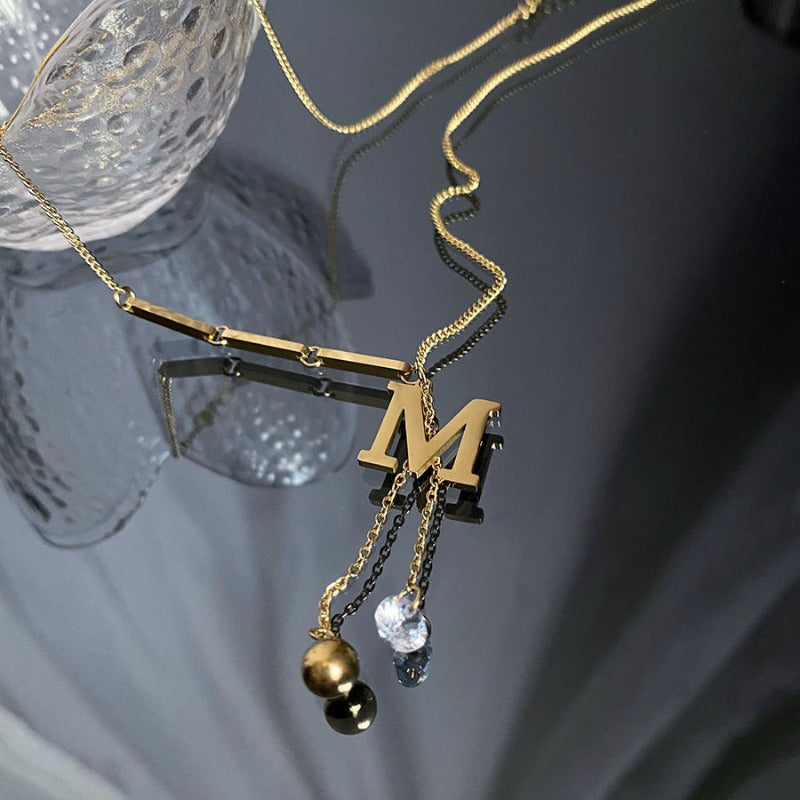 Collana a catena con pendente a forma di lettera M in acciaio titanio, design esclusivo, accessorio hip-hop per donna, Halloween e Natale