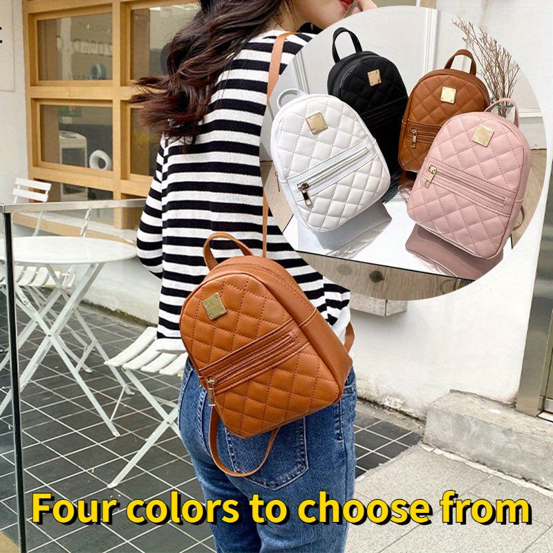 Zaino donna Valstrend in pelle sintetica imbottita, con cerniera, disponibile in bianco, nero, rosa e marrone scuro.