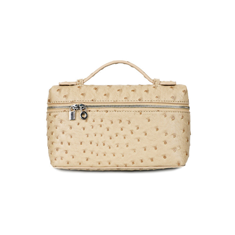 Piccola borsa Valstrend con motivo Lychee, pelle effetto struzzo, forma quadrata, con cerniera e manico compatto.