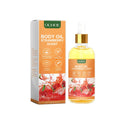 Olio idratante alla fragola Valstrend shop, bottiglia con etichetta e ciotola di fragole fresche, ideale per la cura della pelle.