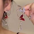 Orecchini lunghi rossi a farfalla per donna, accessorio di moda Valstrend shop, decorativi e eleganti.