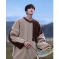 Maglione Niqi Valstrend per ragazzi, stile patchwork con colori contrastanti, ideale per autunno e inverno.