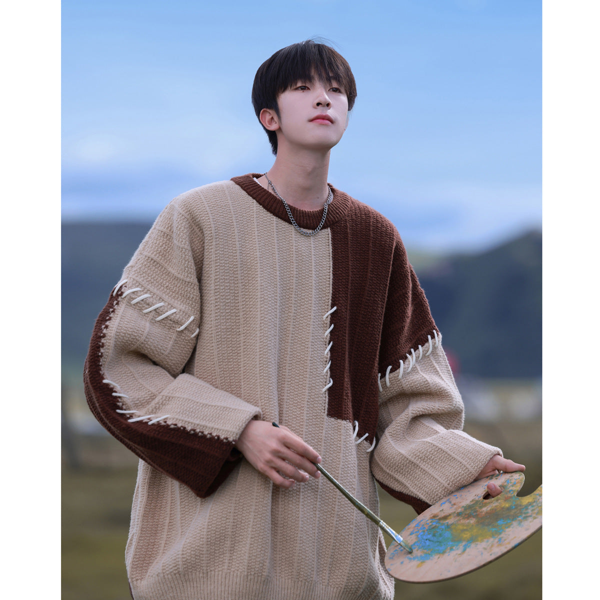 Maglione Niqi Valstrend per ragazzi, stile patchwork con colori contrastanti, ideale per autunno e inverno.