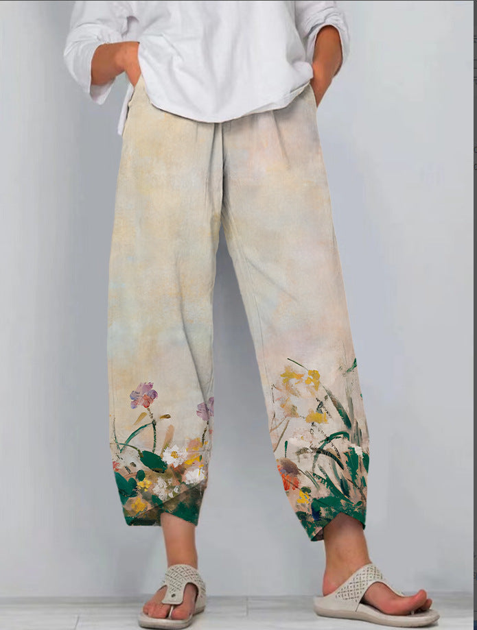Pantaloni larghi casual in tessuto stampato con cintura elastica e gamba dritta, marca Valstrend, visibili in dettaglio nell'immagine.