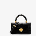 Piccola borsa donna in vera pelle con motivo rettile a coccodrillo, marca Valstrend, dettaglio elegante e raffinato.
