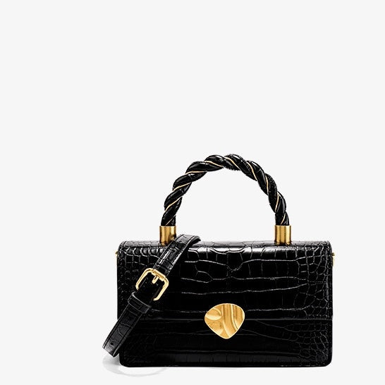 Piccola borsa donna in vera pelle con motivo rettile a coccodrillo, marca Valstrend, dettaglio elegante e raffinato.