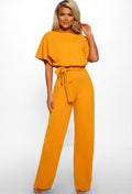 Completo cortissimo con bottoni e lacci, jumpsuit donna Valstrend in tessuto colorato a sette tonalità, maniche corte e stile fashion.