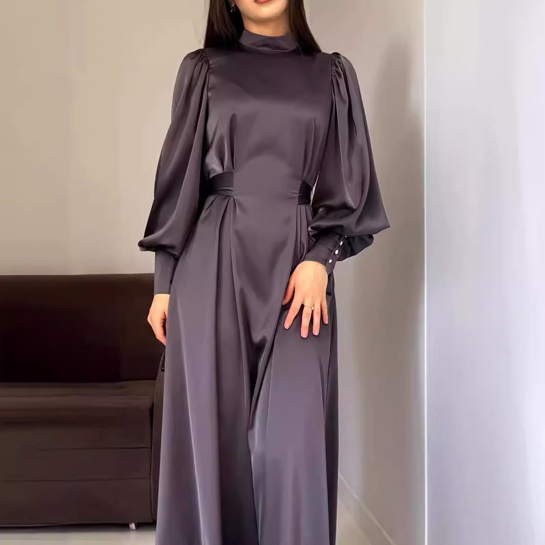 Vestito lungo a maniche lunghe in jersey di colore solido con cintura, stile retrò di Valstrend, abbigliamento elegante e slim fit.
