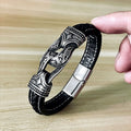 Bracciale vintage in acciaio titanio con intagli in pelle, stile fashion, dettagli artigianali, su sfondo neutro.