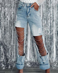 Jeans donna Valstrend con strappi, catene decorative e vestibilità dritta, stile casual e trendy.