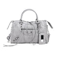 Borsa da donna Valstrend con nappine, tracolla portatile in stile motociclista, elegante e pratica per uso quotidiano.