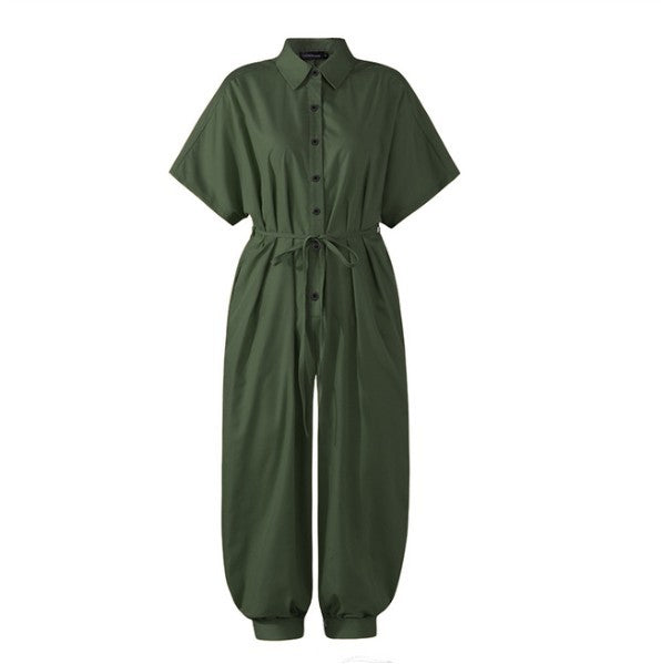 Tuta donna retro a maniche corte con bottoni, stile vintage, marca Valstrend, mostra dettagli della zip e design elegante.