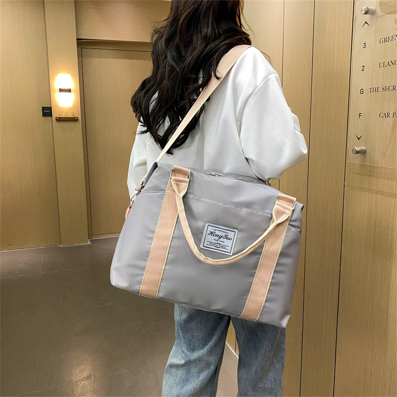 Borsa da viaggio portatile per donna Valstrend, grande capacità, leggera e impermeabile, bagaglio da viaggio resistente.