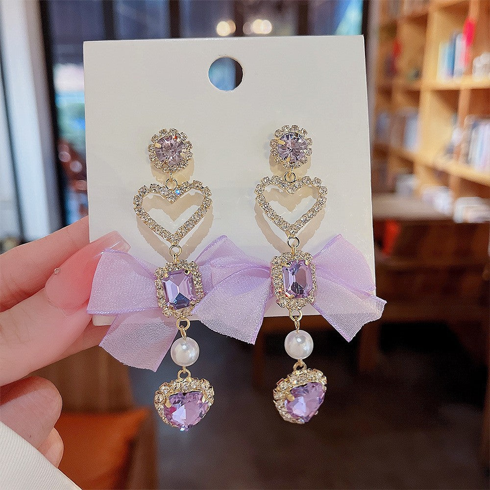 Orecchini in argento sterling con perle di lusso, eleganti e raffinati, perfetti per uno stile sofisticato e personalità distintiva.