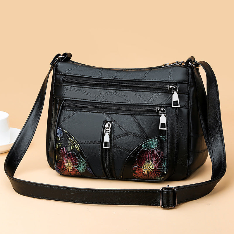 Borsa a tracolla grande per donna Valstrend, tessuto morbido e versatile, con ampio spazio e dettagli eleganti.