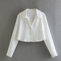 Camicia corta in seta satin stile europeo e americano, texture liscia, brand Valstrend shop, con drappeggio elegante.