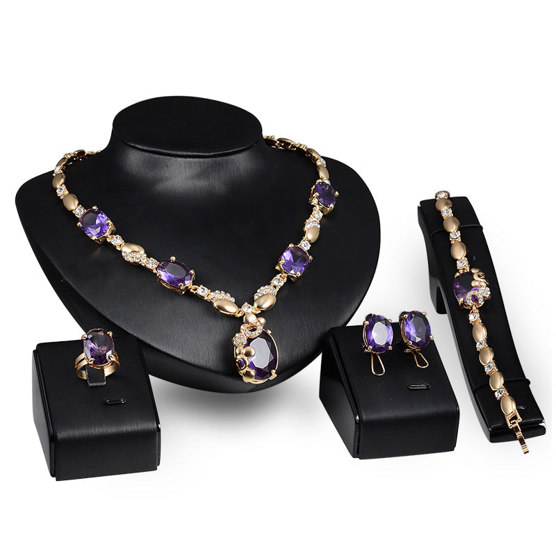 Set di gioielli di moda Europa e Stati Uniti, stile punk da sposa, quattro pezzi, marca Valstrend, mostrato in immagine.