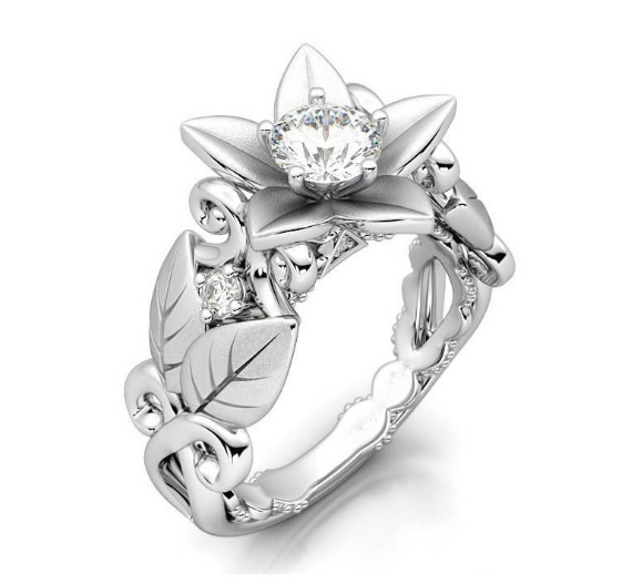 Anello da fidanzamento con fiore di rosa caldo, modello femminile, con zirconi e dettagli a rami, gioiello creativo di Valstrend.
