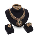 Set di collana, orecchini e bracciali a quattro pezzi Valstrend, gioielli eleganti e coordinati in metallo lucido