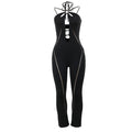 Completo donna Valstrend con top a fascia, pantaloni slim e dettagli traforati, stylish e moderno, in tessuto nero.
