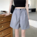 Shorts donna Valstrend in stile retrò, a vita alta e gamba larga, con taglio dritto, visibili in dettaglio nell'immagine.